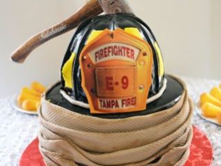 Image for Another variation of the helmet and hose firefighter cake