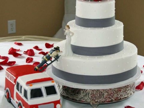 Image for Another Classic Cake with the Fireman to the rescue (they can't help it, even on their big day!) 