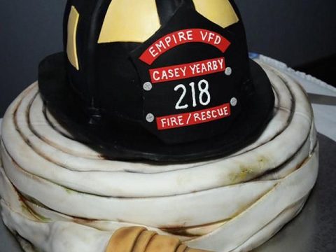 Image for Incredible helmet and hose fireman's cake