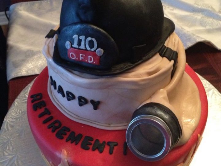Image for Firefighter helmet and hose cake